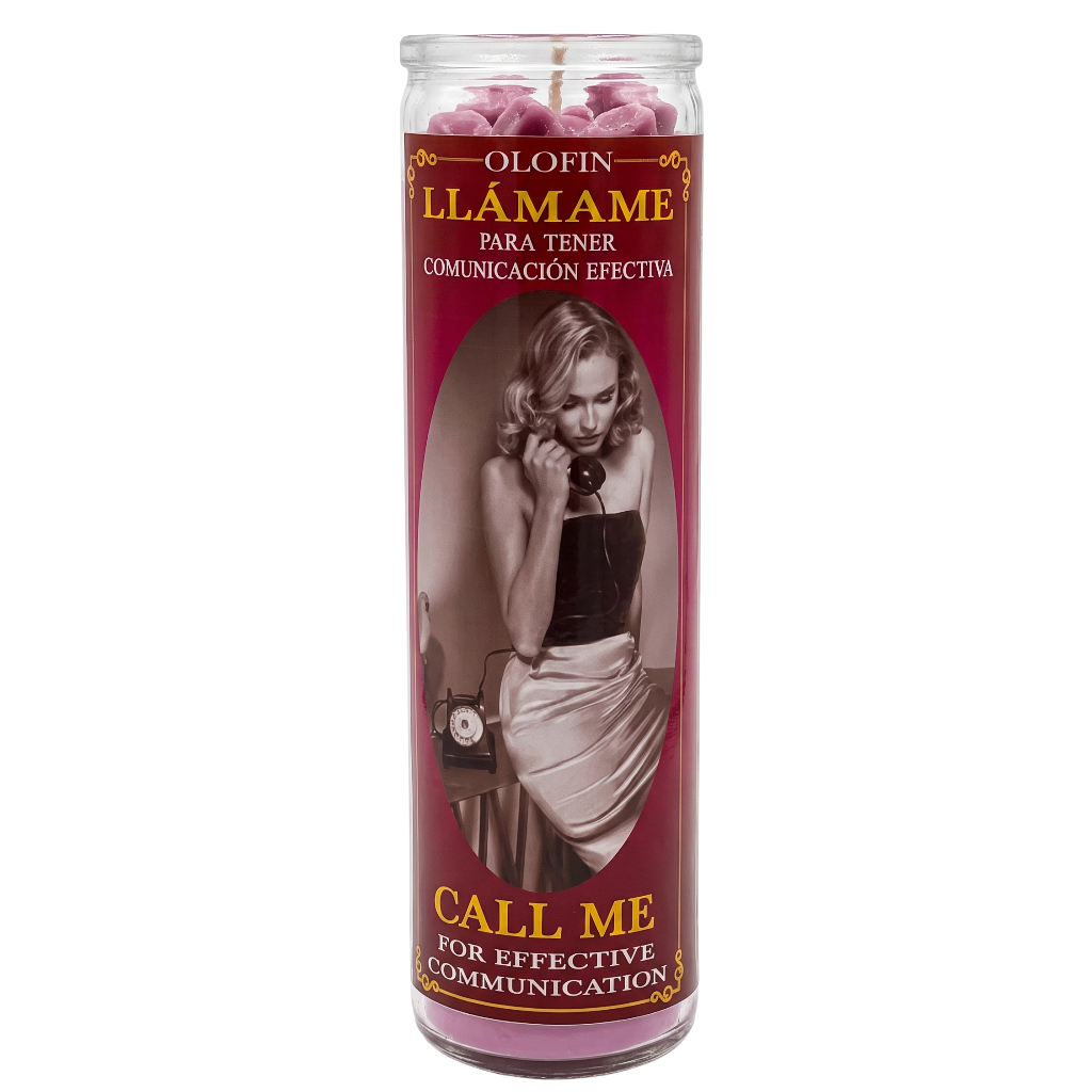 A tall glass prayer candle with a dark red label featuring a vintage-style portrait of a woman and Spanish text reading 'Olofin Llámame Para Tener Comunicación Efectiva' and 'Call Me For Effective Communication.' Pink wax is visible at the top inside the clear glass container.