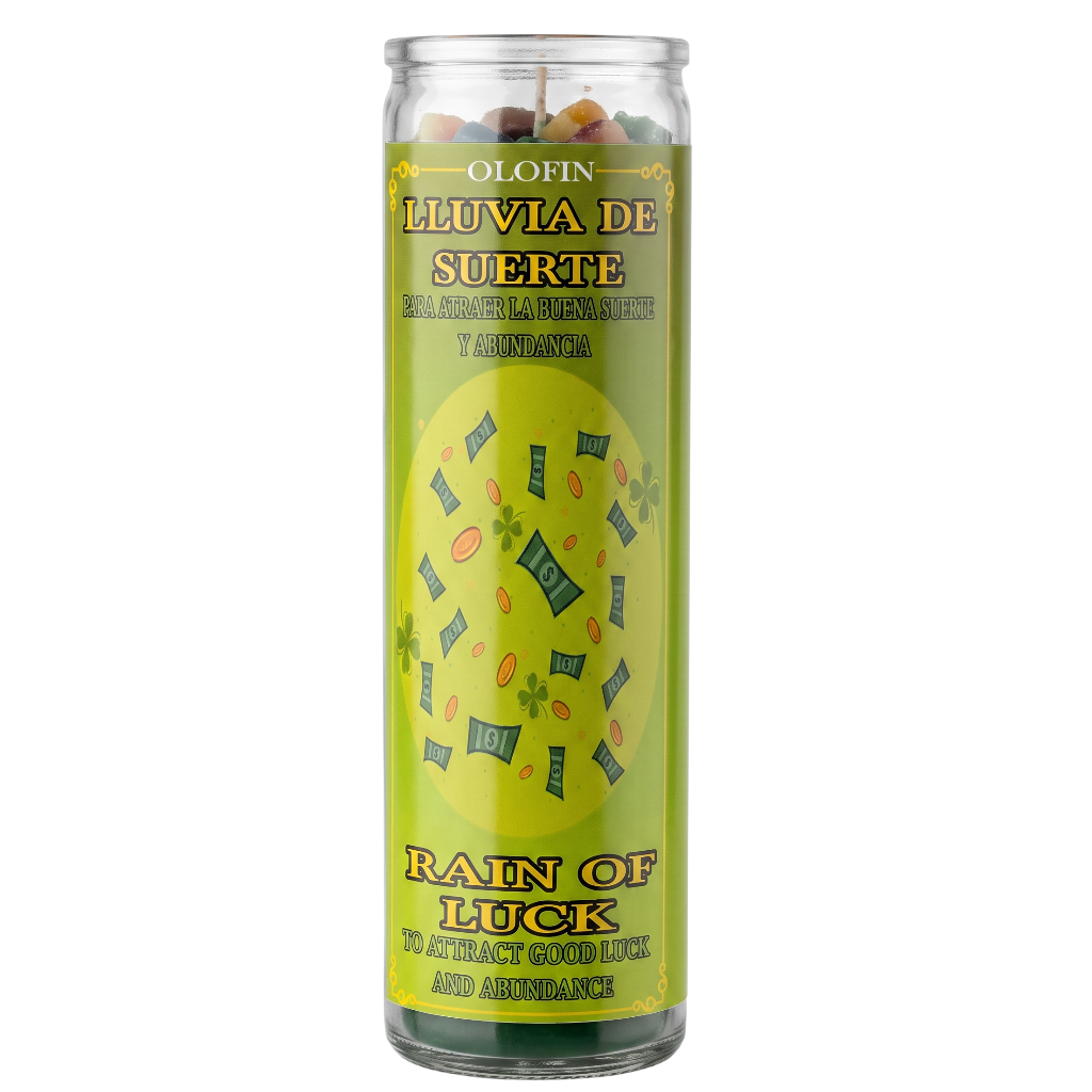 A tall clear glass jar candle with a bright yellow-green label reading 'Olofin Luvia de Suerte' and 'Rain of Luck' in Spanish and English. The label shows a yellow circular design with blue bills and green clovers, and the candle is photographed on a plain white background.