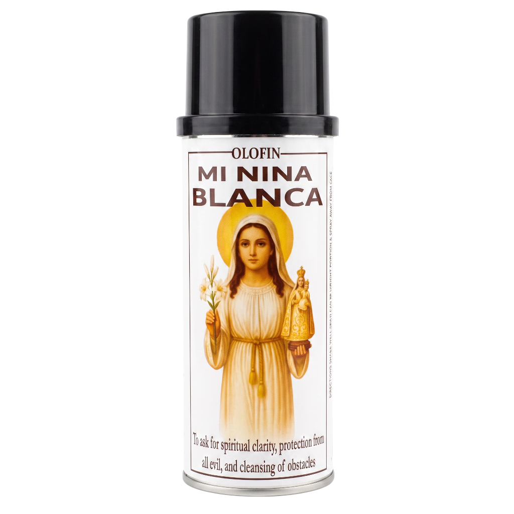 A can of Olofin Mi Nina Blanca spray, featuring a white label with an illustration of the Virgin Mary in a gold halo and a silver metal base, set against a plain white background.