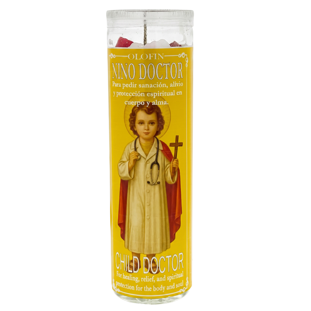 A tall glass prayer candle with a yellow label featuring an illustration of a child dressed as a doctor, labeled 'Nino Doctor' and 'Child Doctor'.