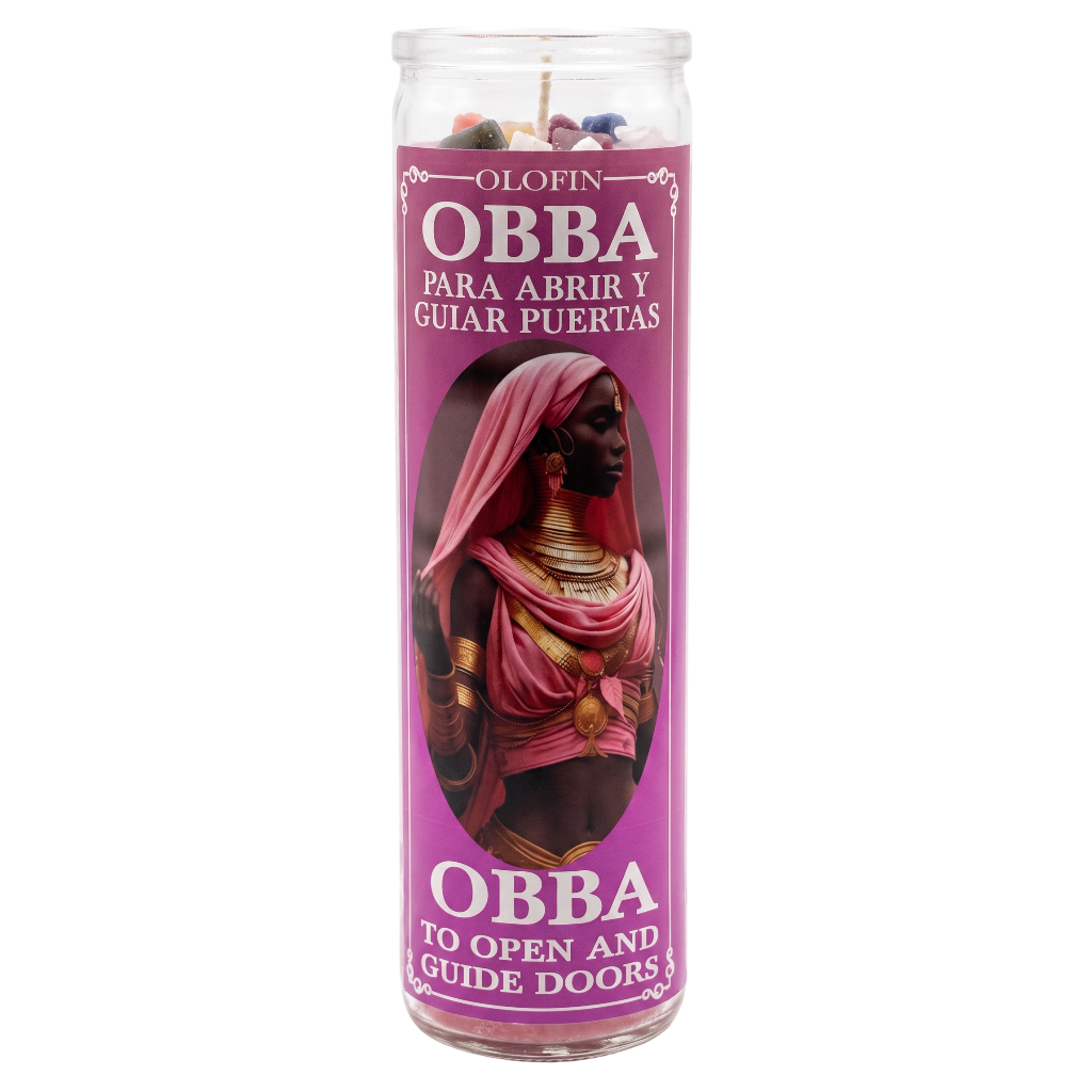 A tall glass jar candle with a purple label featuring an illustration of an Obba figure and Spanish and English text reading 'Obba para abrir y guiar puertas' and 'Obba to open and guide doors.'.