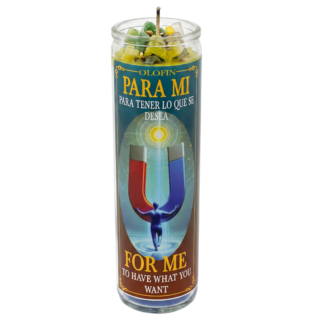 A tall glass prayer candle with a Spanish-language label reading 'OLIVIN PARA MI PARA TENER LO QUE SE DESPA FOR ME TO HAVE WHAT YOU WANT.' The label features a large magnet graphic with red, blue, and gray poles, a small human silhouette, and decorative gold text.