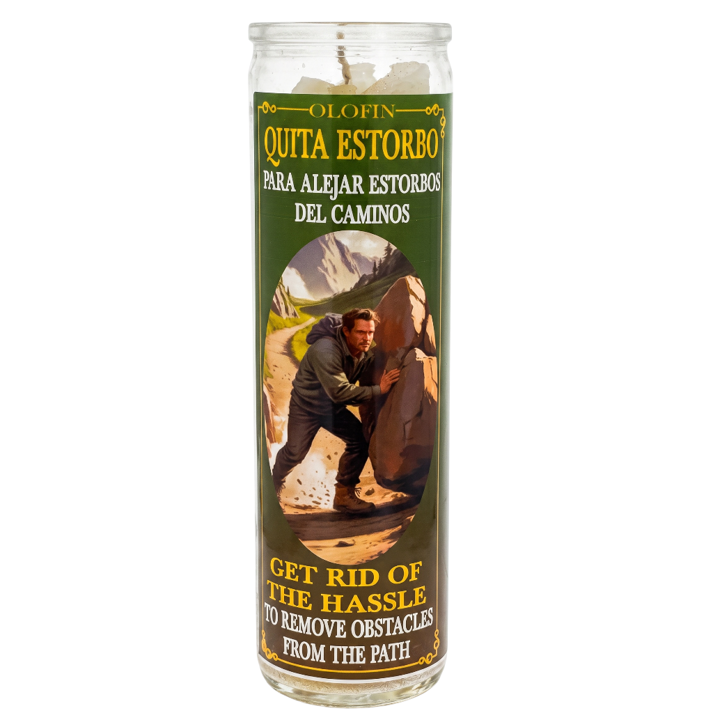 A tall glass jar candle with a green and gold label featuring the text 'Orofin Quita Estorbo Para Alejar Estorbos Del Caminos' and 'Get Rid of the Hassle, To Remove Obstacles from the Path,' with an illustration of a man clearing a rock.