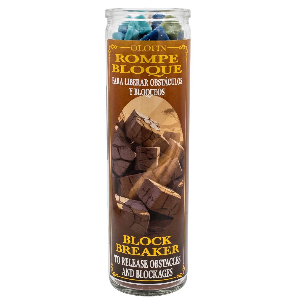A tall clear glass jar candle labeled 'Olofin Rompe Bloque Block Breaker' with a brown label and multicolored wax pieces visible at the top, shown on a plain white background.