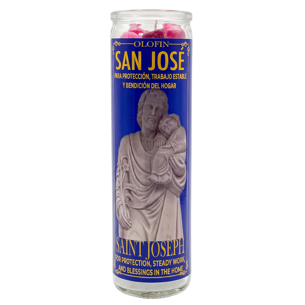 A tall glass devotional candle labeled 'OLOFIN SAN JOSE' with a blue label, white saint illustration, and pink wax visible at the top, shown on a plain white background.