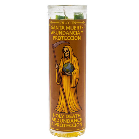A tall glass prayer candle with a brown label featuring an illustration of the Grim Reaper holding a globe and scythe. The label has Spanish text 'SANTA MUERTE ABUNDANCIA Y PROTECCION' and English text 'HOLY DEATH ABUNDANCE & PROTECTION'.