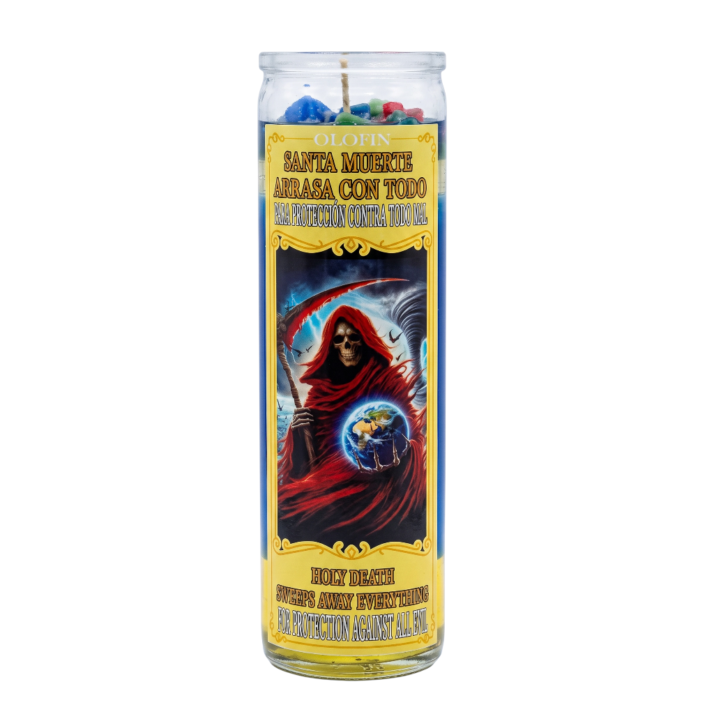 A tall glass devotional candle with a colorful Santa Muerte label, featuring a hooded figure holding a globe and a scythe, on a plain white background.