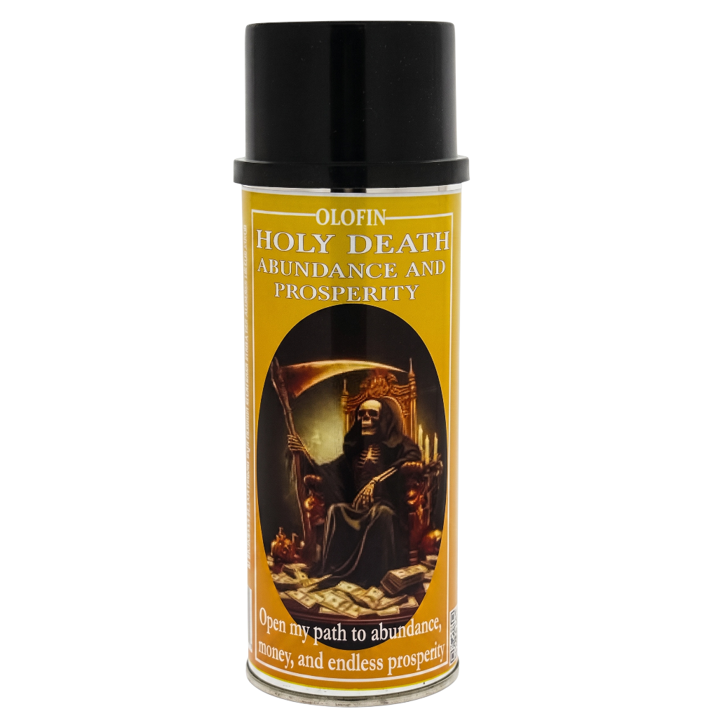 A spray can of Olofin Holy Death Abundance and Prosperity spell casting spray, featuring a black cap and a golden-yellow label with an illustration of a cloaked saint.