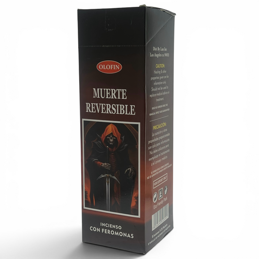 Olofin Muerte Reversible incense with pheromones in a tall black cardboard box with Spanish text and a dark hooded figure graphic on the front, photographed on a white background.
