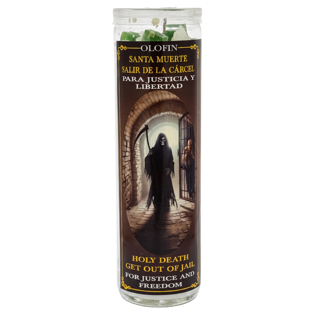 A tall glass prayer candle with a printed label featuring a grim reaper standing in a prison cell. The label reads 'OLOFIN SANTA MUERTE SALIR DE LA CÁRCEL PARA JUSTICIA Y LIBERTAD' and 'HOLY DEATH GET OUT OF JAIL FOR JUSTICE AND FREEDOM.