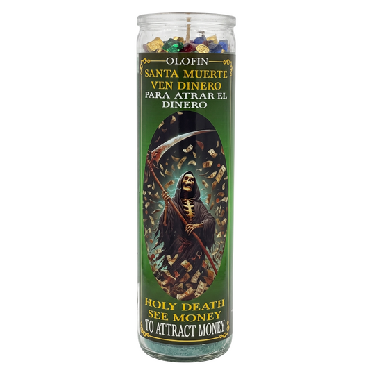 A tall glass prayer candle with a green label featuring an illustration of the Grim Reaper holding a scythe, surrounded by gold coins. The label has Spanish text at the top and English text at the bottom reading 'Holy Death See Money' and 'To Attract Money.