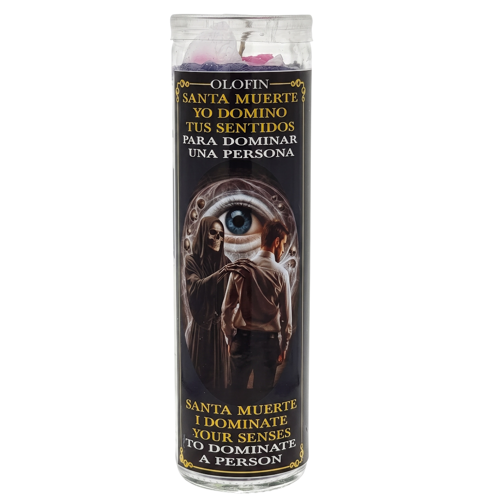 A tall glass jar candle with a black label featuring Santa Muerte artwork and Spanish and English text, shown on a plain white background.