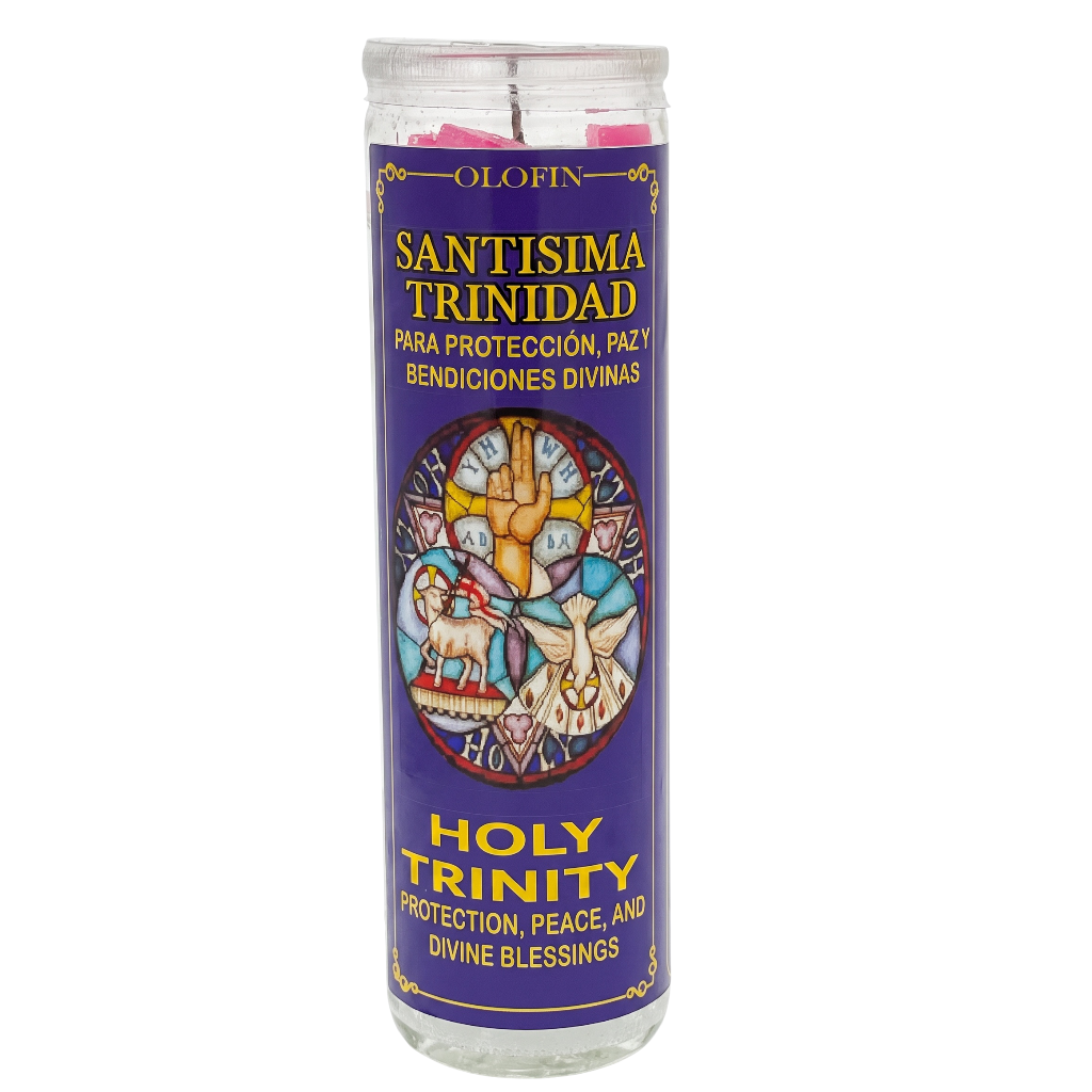 A tall glass jar prayer candle with a purple label reading 'Santisima Trinidad' and 'Holy Trinity' in yellow text, featuring a stained-glass-style religious illustration in the center. The candle is photographed on a plain white background.