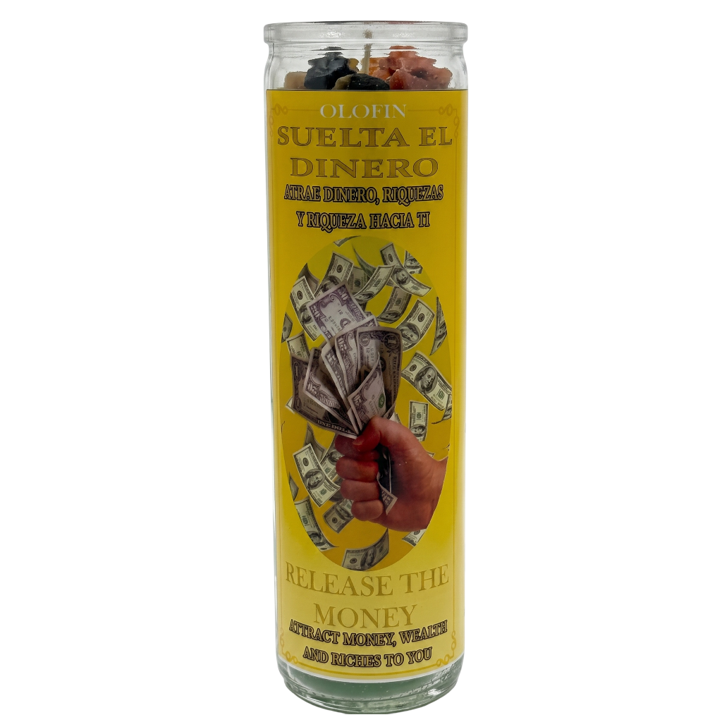 A tall glass prayer candle with a yellow label reading 'Olor Suelta El Dinero' and 'Release the Money,' featuring an illustration of a hand holding cash and dollar bills floating around it. The candle is shown upright on a plain white background.