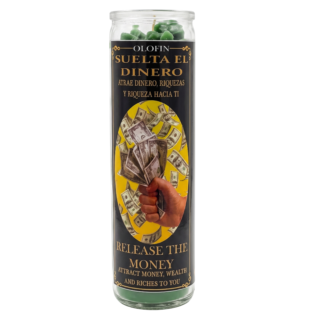 A tall glass prayer candle with green wax and a black printed label reading 'Olopin Suelta El Dinero' and 'Release the Money.' The label shows a hand holding cash and a yellow oval graphic.