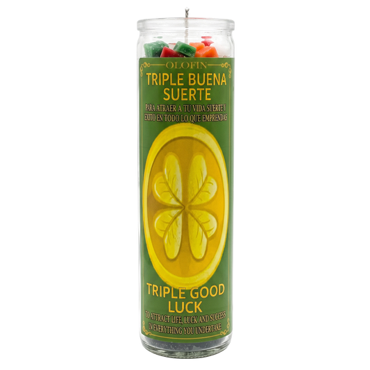 A tall glass jar candle labeled 'OLOFIN TRIPLE BUENA SUERTE / TRIPLE GOOD LUCK' with a green and yellow label and multicolored wax pieces visible at the top, shown on a plain white background.